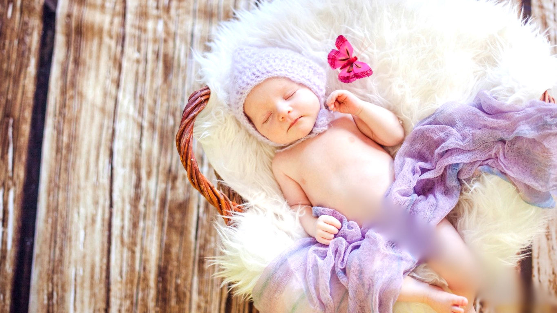 Sleeping Baby Child Is Lying Down On Fur Cloth Wearing Light Purple Woolen Knitted Cap HD