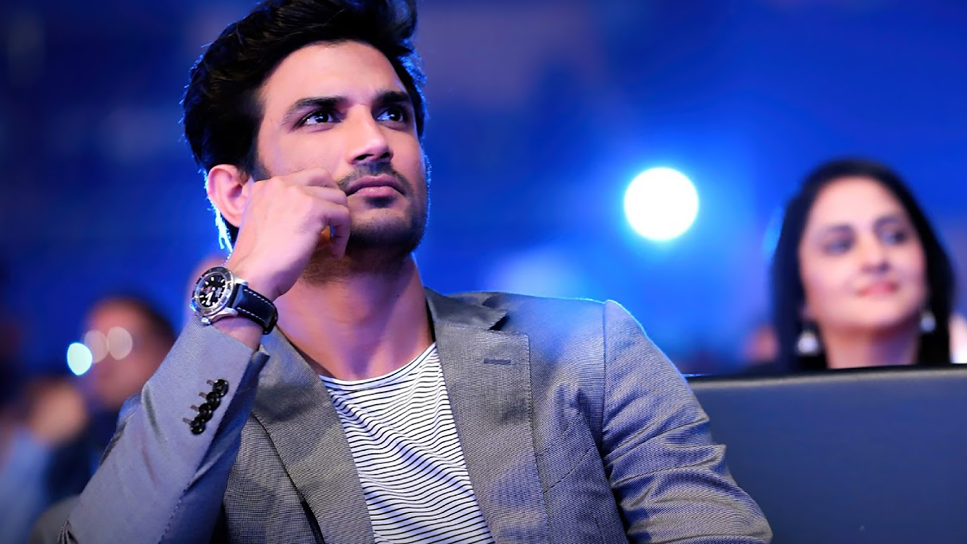 Sushant Is Wearing Black White Striped T-Shirt And Ash Overcoat In Blue Wallpaper HD Sushant Singh Rajput