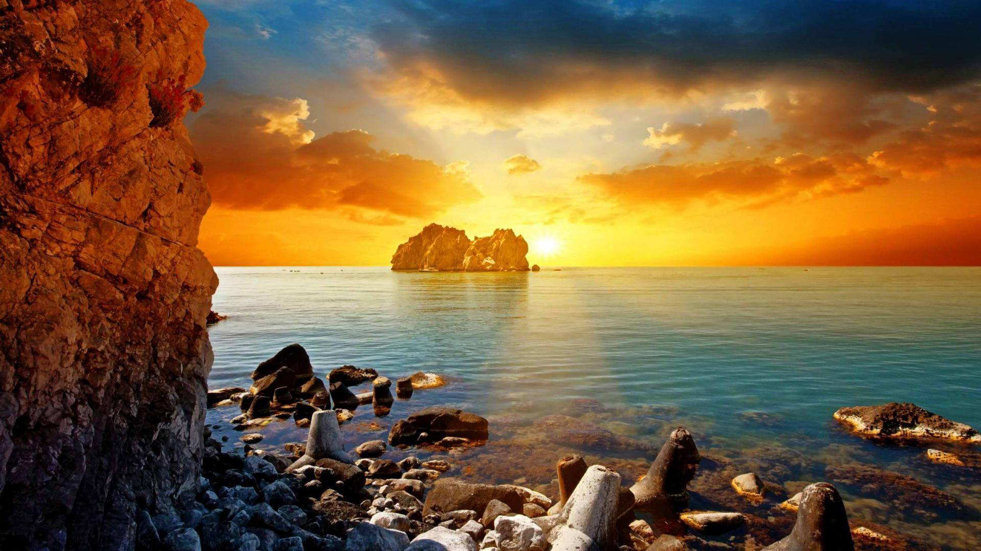 Sea And Rocks Under Cloudy Sky With Yellow Sunset HD Sunset
