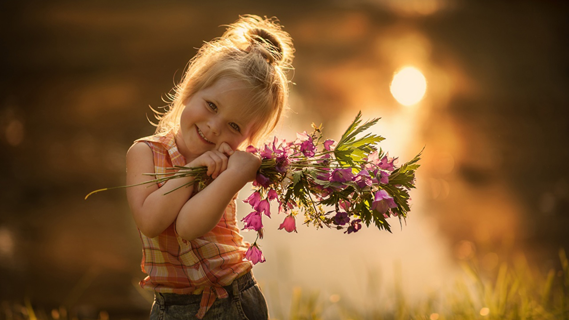 Smiley Little Girl With Bouquet Is Standing In Lights Bokeh Wallpaper HD