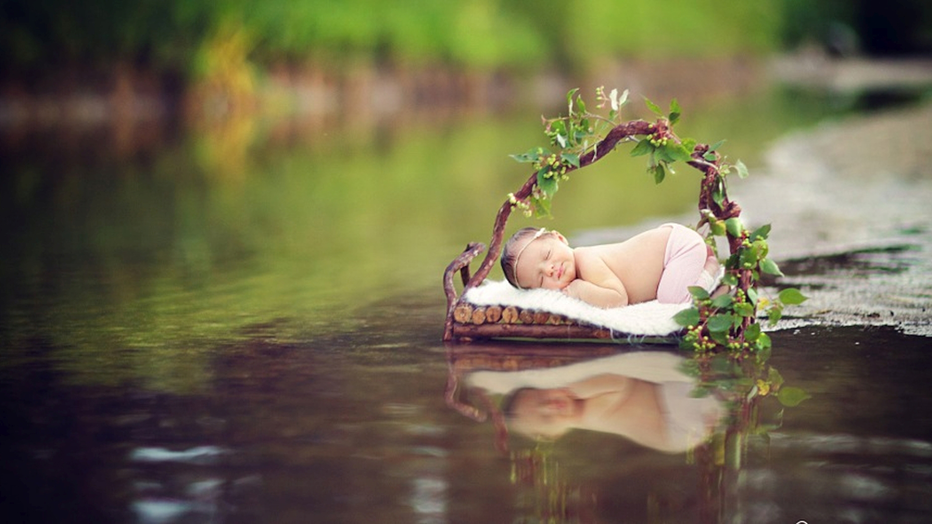 Baby Child Is Sleeping On White Cloth Reflection On Water HD