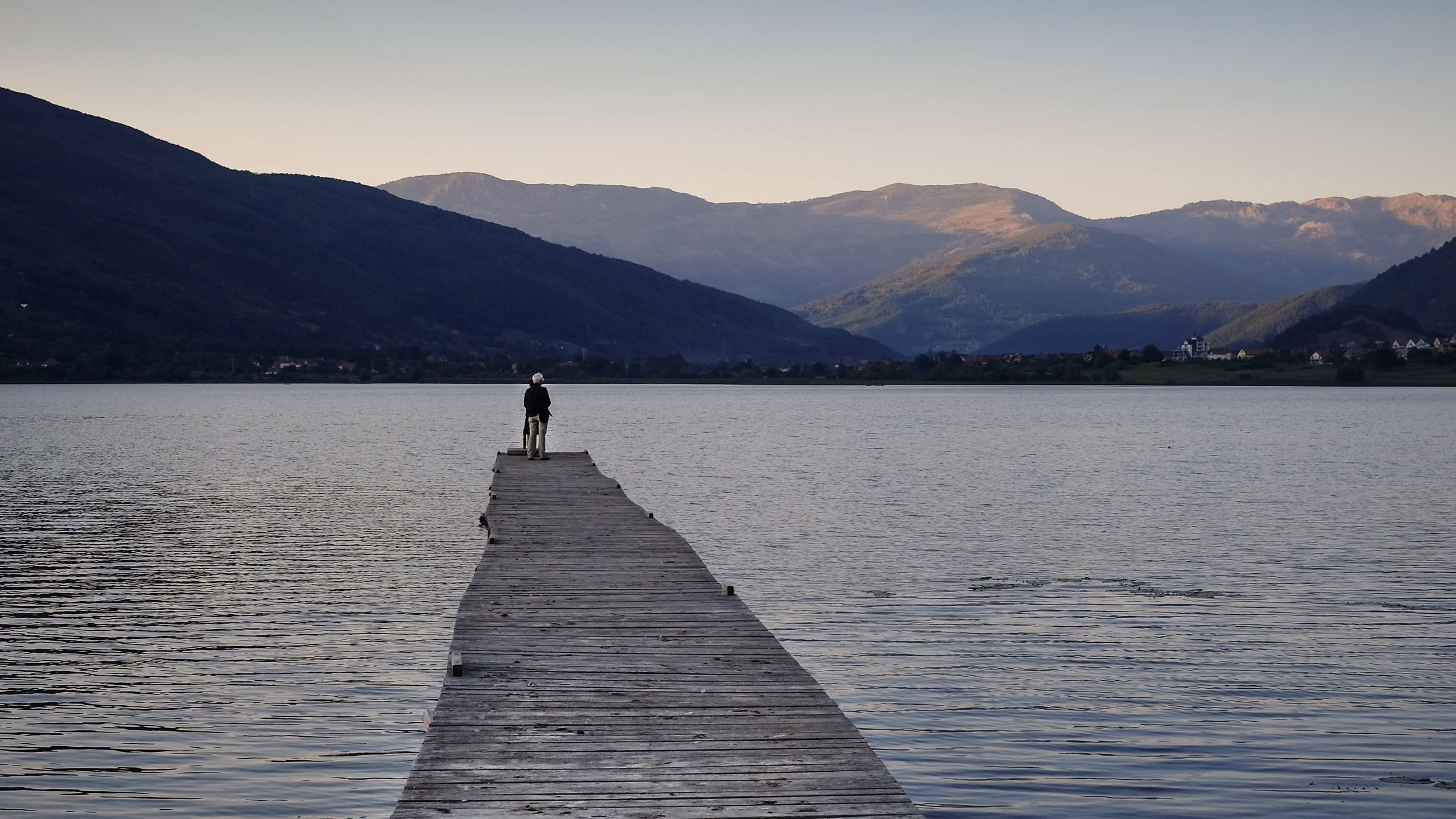 Sad Looking Man Is Standing Alone On Pier Lake HD Sad