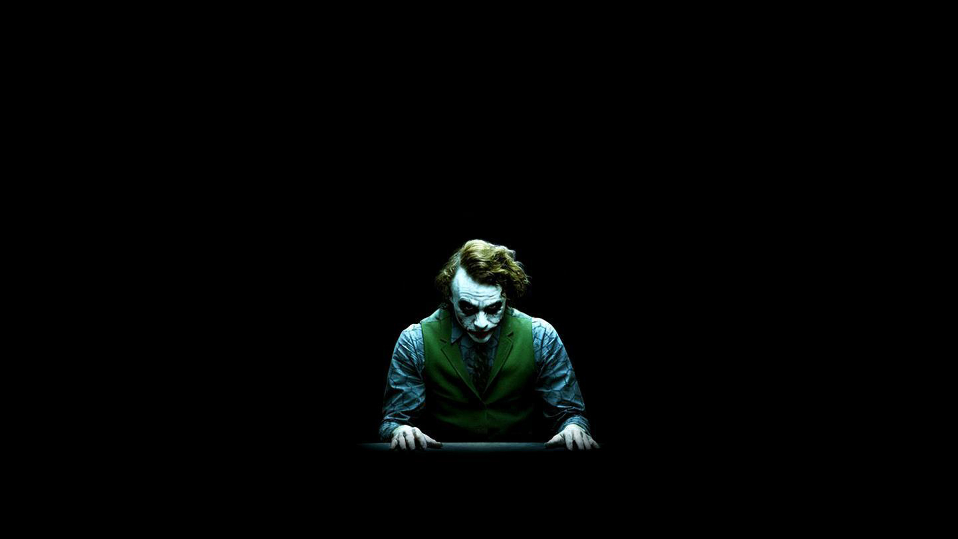 Green Vise Coat Wearing Joker Joaquin Phoenix With Black Wallpaper HD Joker