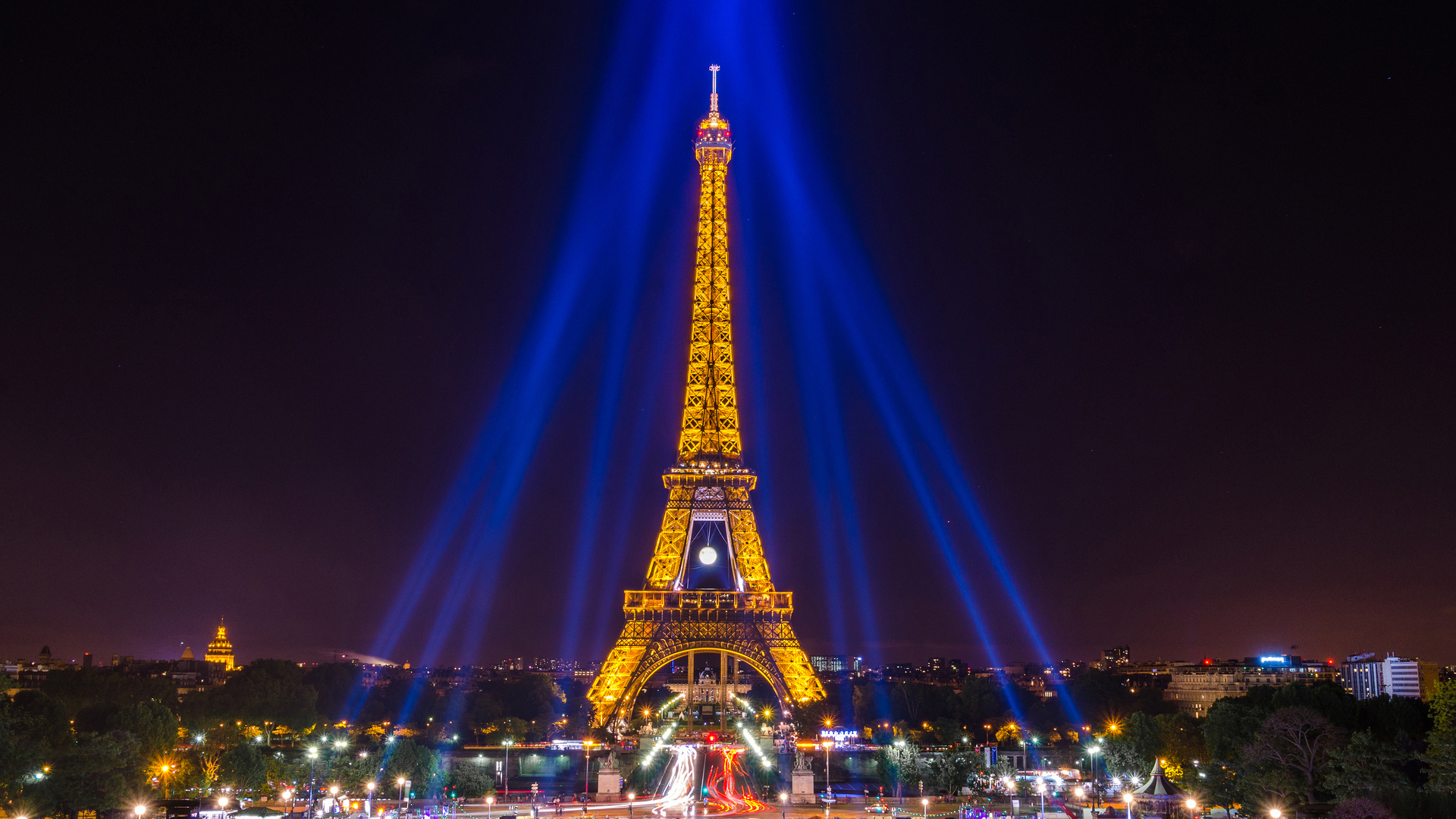 Yellow Lighting Paris Eiffel Tower Around Blue Lights With Black Sky Wallpaper HD Travel