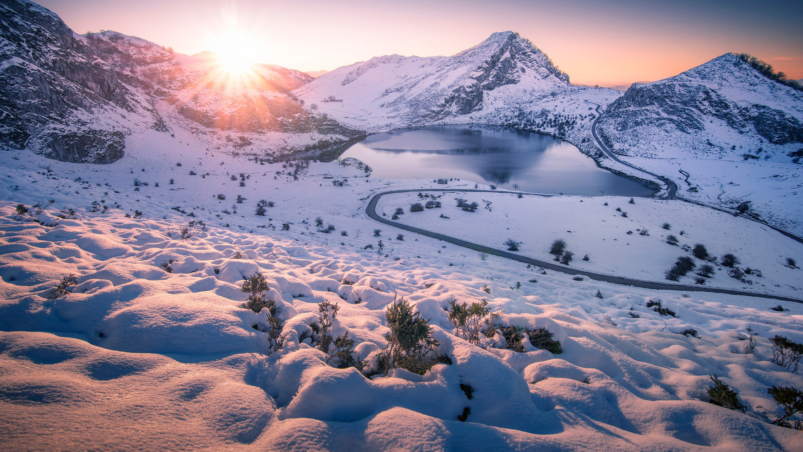 Lake Surrounded By Snow Covered Mountains With Sunbeam HD Nature