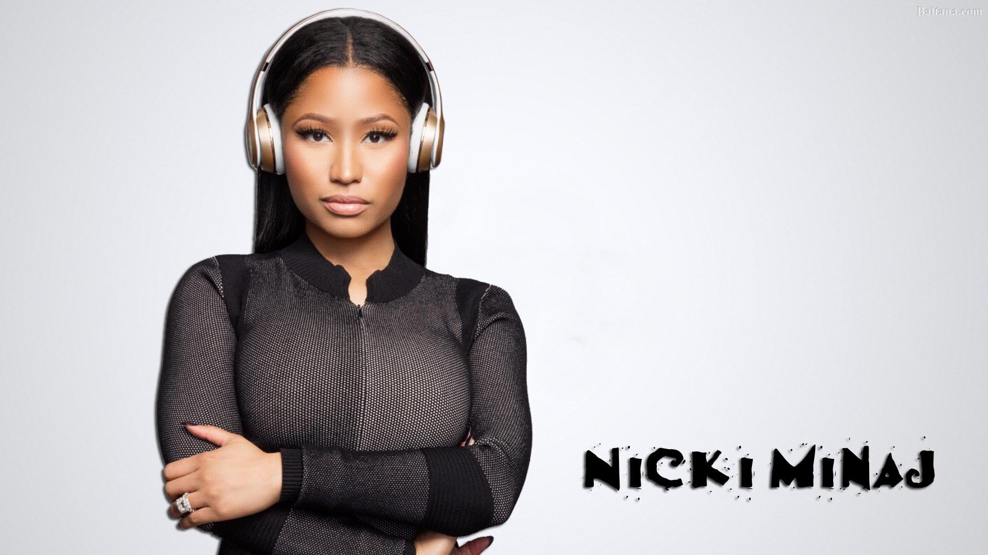 Nicki Minaj With Headphones Is Wearing Black Dress HD Girls