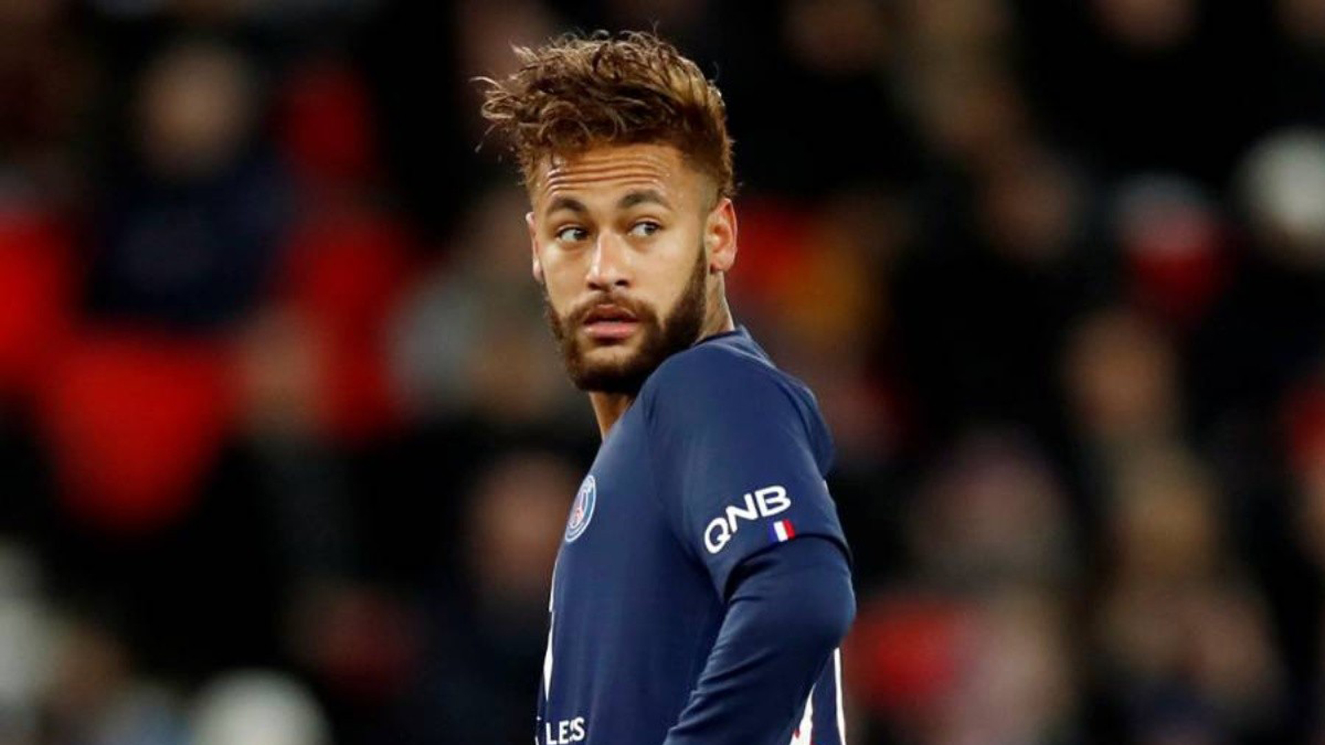 Neymar da Silva Santos Junior Is Standing In Blur Audience Wallpaper Wearing Paris Saint-Germain FC Dress HD Neymar