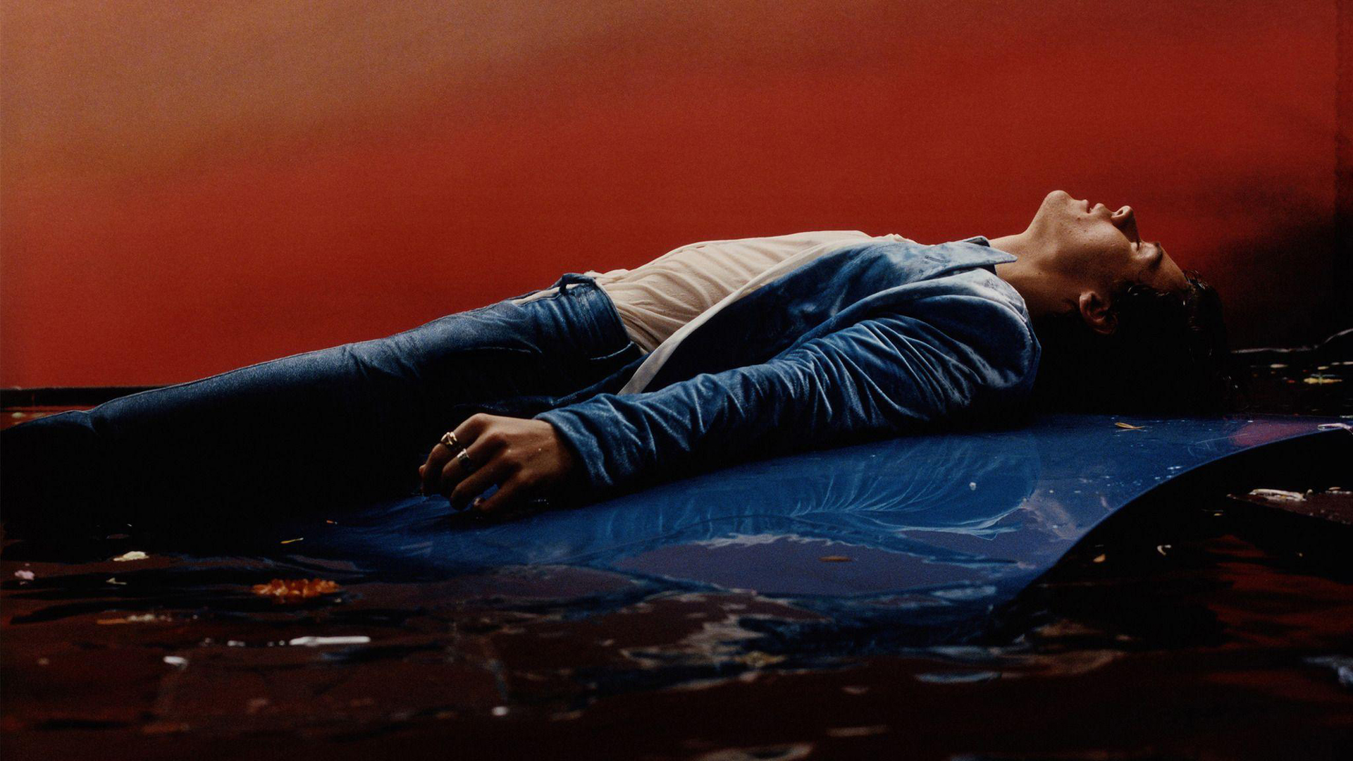 Harry Styles Is Lying Down On Water Wearing Blue White Dress HD Harry Styles